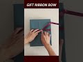 How to tie a ribbon bow on gift box