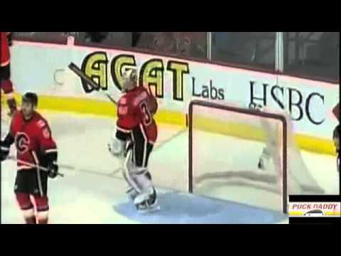 Minnesota Wild's Zanon tweaks Clutterbuck's nose after goal