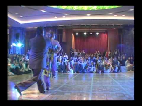  Nancy Louzan  and  Damian Ignacio Eselevsky Esell  are  dancing  to  the  tango  "  El Arranque  "