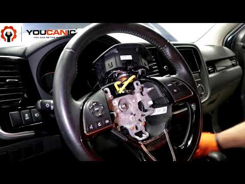 How to Remove the Buttons on the Steering Wheel on a Mitsubishi
