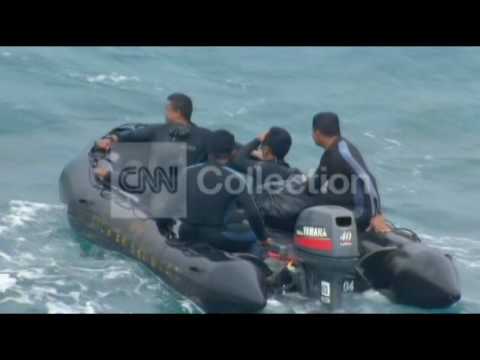 AIRASIA 8501: DIVERS ATTEMPT TO LIFT TAIL THURSDAY