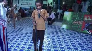 A blind Liberian boy sings to Flavour's song