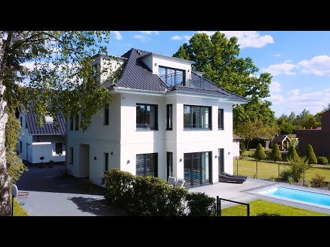 Moderne Stadtvilla im Jugendstil mit ausgebautem Dachgeschoss und Erker von ARGE-HAUS GmbH