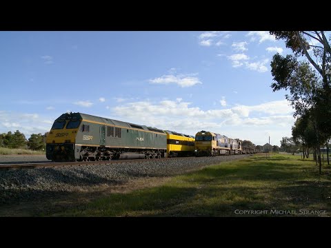 7XM4 Steel Train Passes Stabled SSR Grain Train - PoathTV Australian Railways