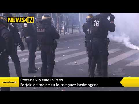 Proteste violente în Paris. Forţele de ordine au folosit gaze lacrimogene