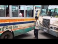 Dhaka city bus helper calling for passenger