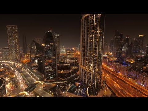 Illuminated City Skyline Buildings and Roads at Night | Stock Footage - Videohive