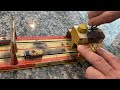 VINTAGE UNIQUE ART MFG CO S LINCOLN TUNNEL TIN CLOCKWORK FULLY ORIGINAL AND FULLY OPERATIONAL