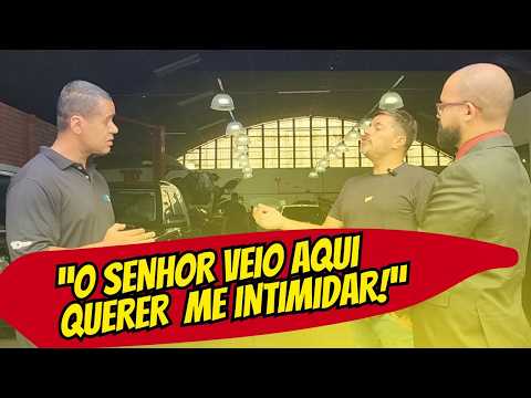 DISCUSSÃO ENTRE ADVOGADO E JORNALISTA MARCA REPORTAGEM EM  OFICINA MECÂNICA.