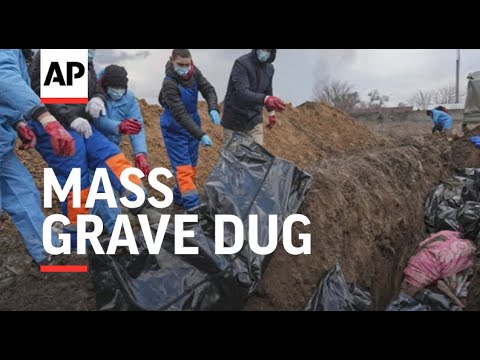 Mass grave dug; evacuations in Ukraine