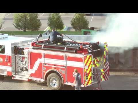 Firefighter Slips On Top Fire Truck at Dumpster Fire – Firefighter Spot