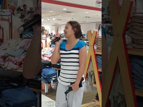 Nalah singing "One Moment in Time" at the Mall