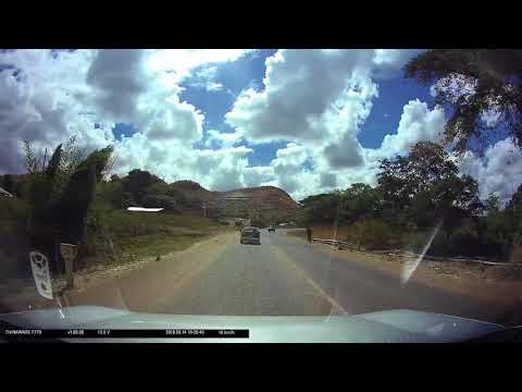 Driving in Malawi: Land cruiser hitting speed bump at full speed