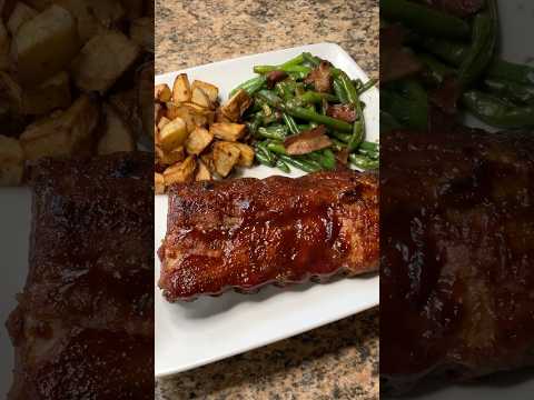 Fall-off-the-bone Crockpot BBQ Ribs—no grill or smoker needed! #easyrecipe #bbqribs #ribs #crockpot