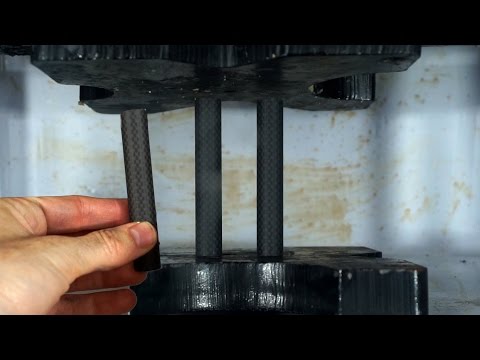 Carbon Composite Fiber Tubes Crushed In Hydraulic Press