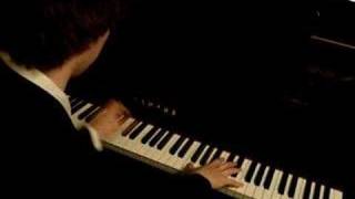 Pianist playing Pas De Deux on Grand Piano