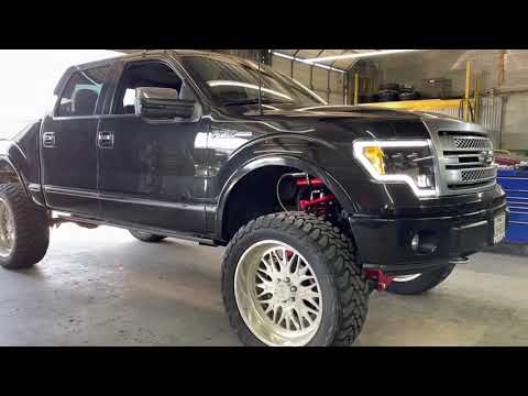 F-150 with Full throttle suspension lift and American force rims