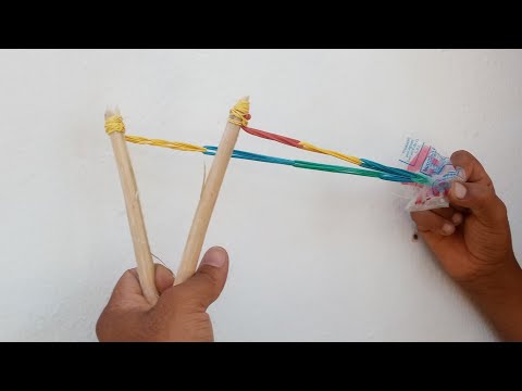 Cómo hacer una #resortera oh #tirapiedras #honda #tirachinas muy fácil 👍 mira y aprende