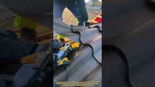 The Process of Cutting Metal Roofing Tiles on the Roof Framework