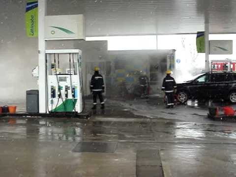 police van on fire at service station