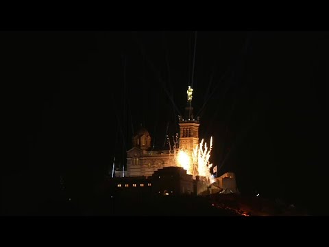 Video | Marseille basilica unveils restored Virgin Mary statue with light show | AFP