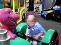 Coley On The Barney Ride At Chuck E Cheese For His Birthday Party