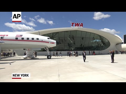 The famous winged TWA terminal at New York's John F. Kennedy Airport came out of its decades-long retirement Wednesday with a new life as a luxury hotel. (May 15)