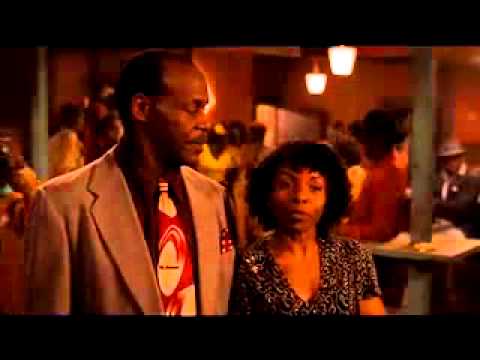 Trailer still: Danny Glover as Pine Top inside the Honeydripper Lounge, piano and bar crowd