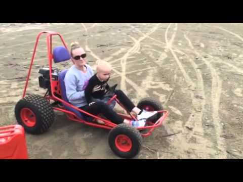 Sharyn and the kids on the beach