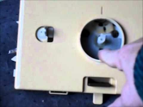 removing and replacing the stitch dial on an HK 100 singer or studio knitting machine