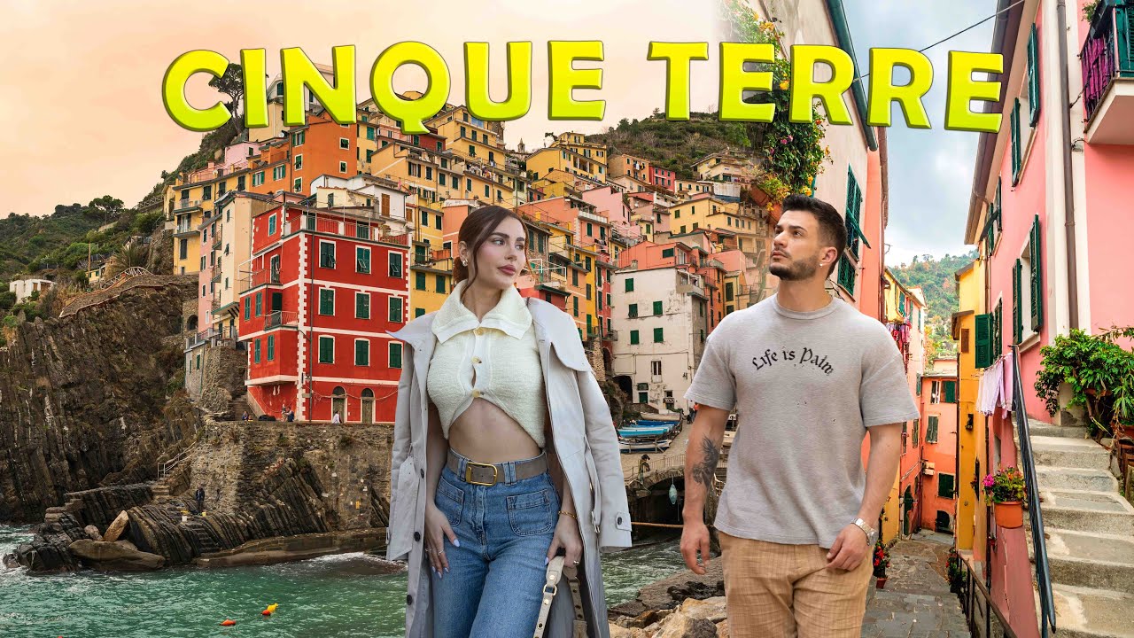 Travelers explore Vernazza town & many more.