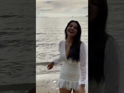 Ananya Nagalla in White Color Attire Enjoying Herself near Beach Latest Video VDownloader