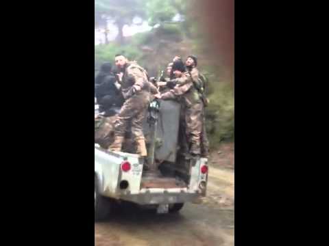 عودة مقاتلي كتيبة المصطفى بعد استهدافهم نقاط قوات النظام عن طريق غارة عابرة في قمة ال45 في ريف اللاذقية