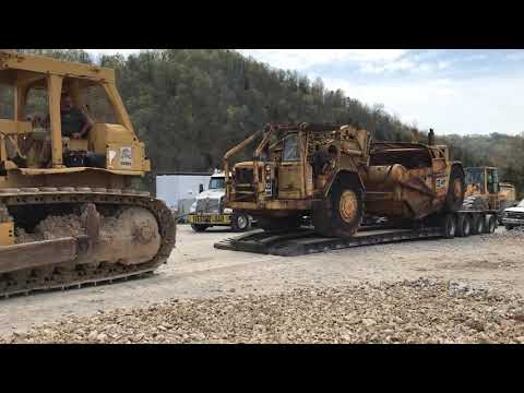 Unloading an antique scraper