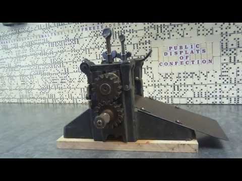 A stop animation of a V. Clad and Sons candy drop roller machine