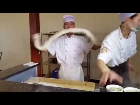 Chinese man making noodles