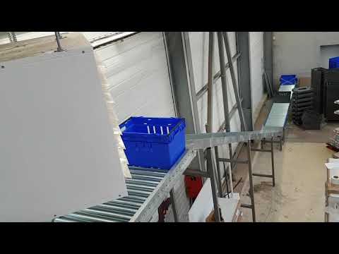 Toboggan industriel - Convoyeur à rouleaux pour la descente des caisses d'une plateforme vers le rez-de-chaussée_1