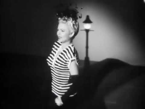 Marjorie Reynolds (dubbed by Martha Mears) and chorus girls - Fifth Avenue