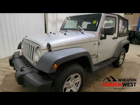 2011 Jeep Wrangler 4WD 2dr Sport in Bright Silver Metallic for sale at Wheaton Honda West in Calgary, AB