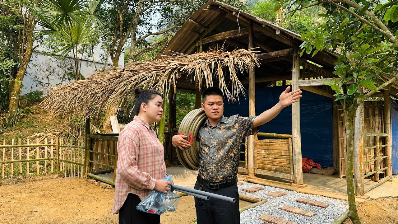 CEO Tung and Tu Anh install water pipes to begin construction of the new farm