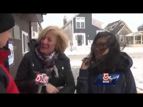 Coastal residents board up homes as storm pounds coast