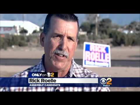 State Assembly Hopeful's Campaign Sign Depicts Rifle-Toting Woman