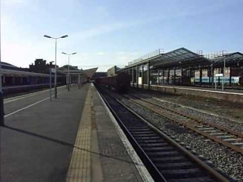 57311heads through Chester with the 6J37 Carlisle - Chirk log train 04.04.09