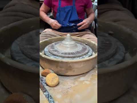 Sylvia Coppola throwing mini pots off the hump