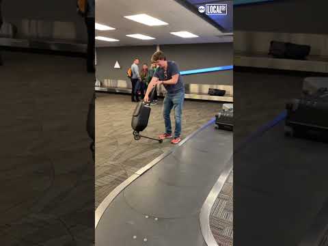 Man rides scooter luggage. #travel #airport #adventure