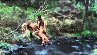 Caveman.  1981.  Tar pit scene.