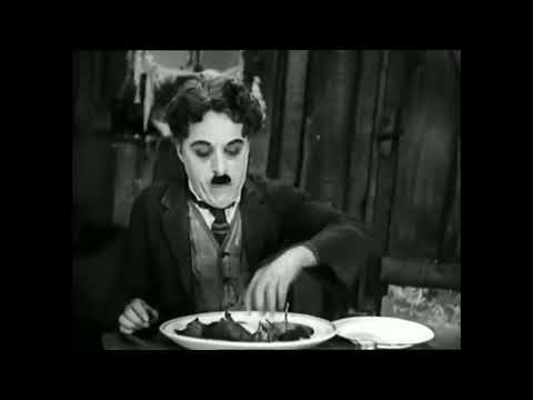 Charlie Chaplin eating his shoe
