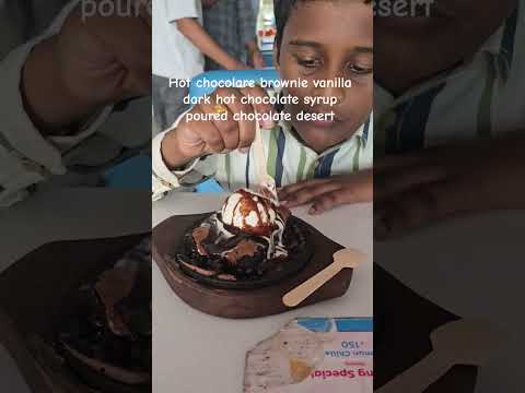chocolate brownie milk chocolate vanilla chocolate syrup poured chocolate dessert in dessertino