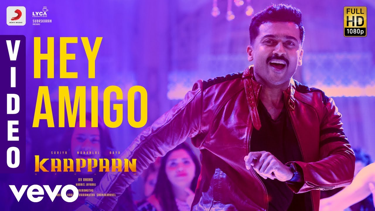 Hey Amigo Song Lyrics | Kaappaan (2019) | Leslie Lewis, Jonita Gandhi