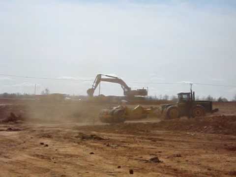 Cat 375L Loading rock trucks